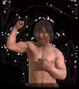 Image: Etuk-a-suk showing his muscles